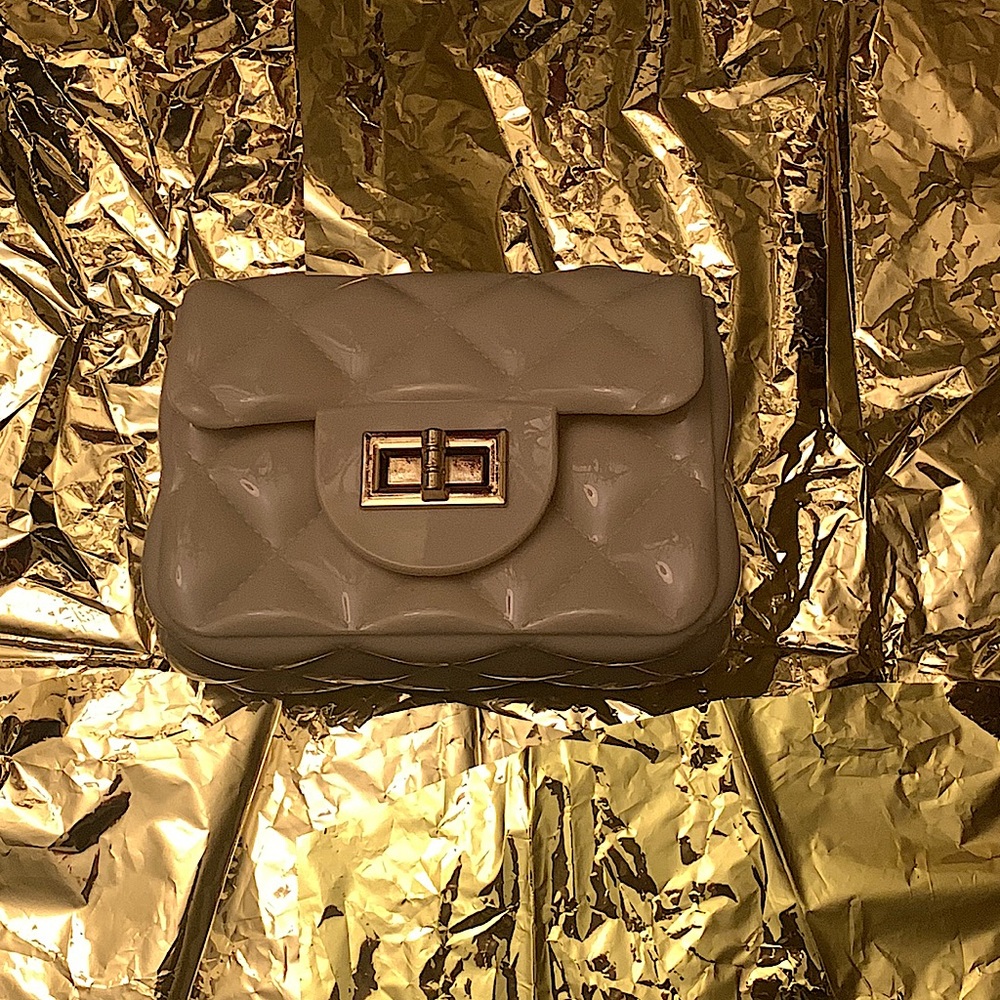 I’m selling cute mini bags  and I’m doing holiday specials so it’s half off.
